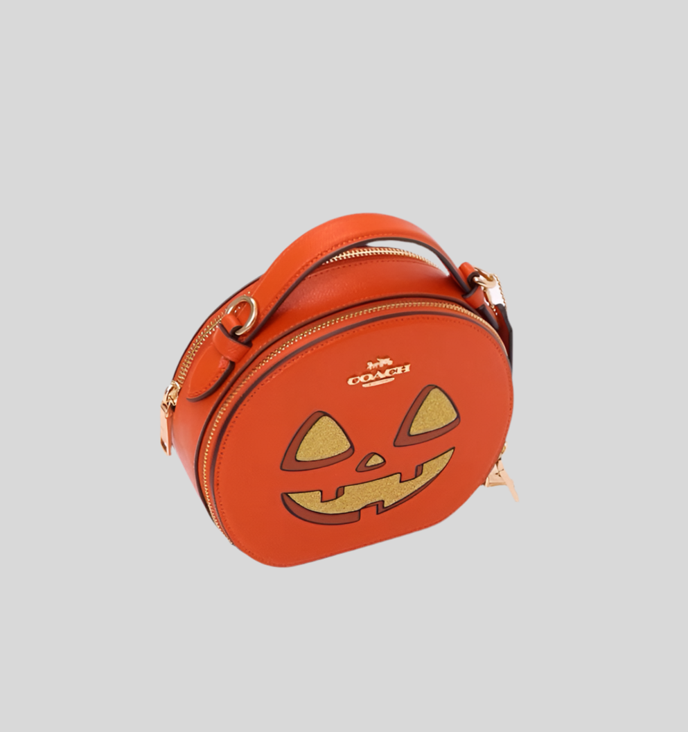 コーチ キャンティーン クロスボディ レザーバッグ（ハロウィンパンプキンプリント）