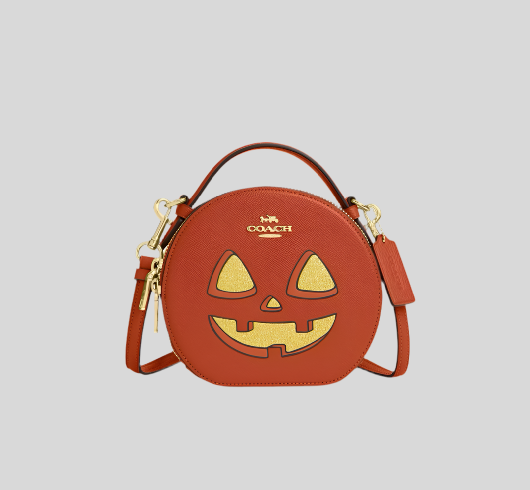 コーチ キャンティーン クロスボディ レザーバッグ（ハロウィンパンプキンプリント）